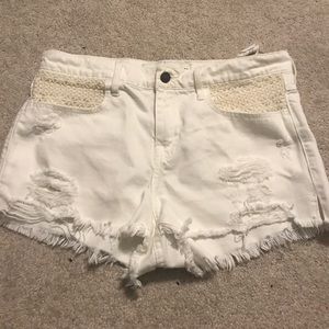 White medium rise shorts